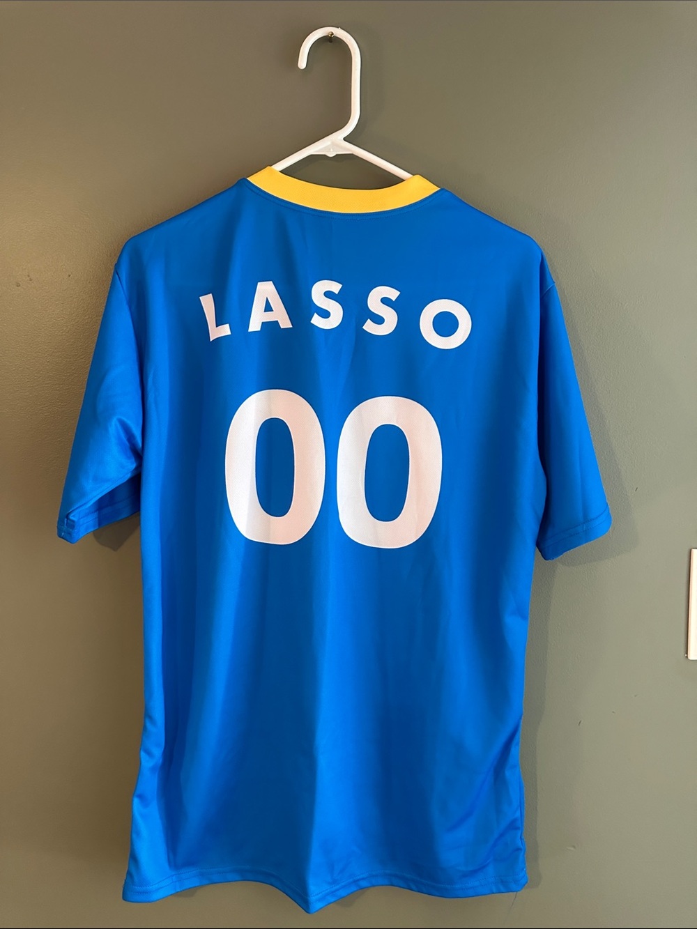 Ted Lasso Blue and Red Athletic Jersey with Yellow Trim - Picture 4 of 4